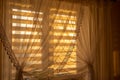 Curtain interior sunset. House room. run lighting through transparent curtain on window into bedroom at evening sunny day