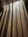 Curtain with the morning sun shadow penetrated into the room. Royalty Free Stock Photo