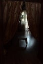 Curtain with warm sunlight behind the dark room. For cozy home and decoration Living and lifestyle concept Royalty Free Stock Photo