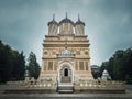 Curtea de Arges old Christian Orthodox monastery in Romania. Beautiful Cathedral facade and architectural details from the legend Royalty Free Stock Photo