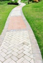 Curve brick path in garden Royalty Free Stock Photo