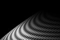 Curve carbon fiber on the black shadow. Royalty Free Stock Photo