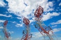 Curve mobile phone communication antenna tower with the blue sky Royalty Free Stock Photo