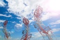 Curve mobile phone communication antenna tower with the blue sky Royalty Free Stock Photo