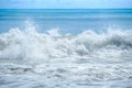 Curve of ocean wave with splash of water, Thailand