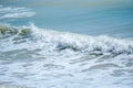 Curve of ocean wave with splash of water, Thailand