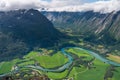 Curve of Rauma river runs through Romsdalen valley in summer season view from Romsdalseggen trekking trail in West of Norway,