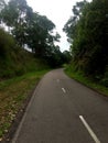 A curve in the the road on a public pedestrian and bike path Royalty Free Stock Photo