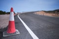 Curve of a road under construction with traffic cones Royalty Free Stock Photo