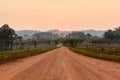 Curve road in the valley with sunrise and mist Royalty Free Stock Photo