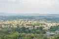 Curve road, Village and town surrounded by countryside with mountain background in central of Thailand Royalty Free Stock Photo