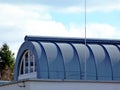 Curve shaped zink plate covered skylight with circular white window