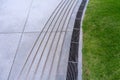 Curve water drain or ditch on the road. Gutters drain grate, drain cover