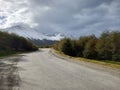 Curved asphalt road in Andes snowy mountain range landscape. Landscape and extreme nature Royalty Free Stock Photo