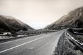 Curved asphalt road in high mountains of ilisu, Gakh, Azerbaijan. Greyscale landscape