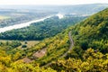 A curved bend of the railway going into the thickets of the forest on the banks of the Dniester River in Moldova Royalty Free Stock Photo