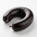 Curved black pudding sausage on a white background Royalty Free Stock Photo