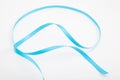 Curved blue wavy ribbon on white