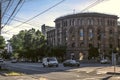 Curved building in the classical style of pink tuff at the intersection of Agatangeghos and Movses Khorenatsi in the city of Yere