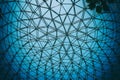 Curved ceiling of dome steel structure with blue sky background Royalty Free Stock Photo