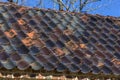 Curved clay roof tiles on old slave cabin