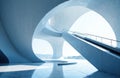 A modern architectural structure featuring smooth, curved concrete surfaces and large circular openings Royalty Free Stock Photo