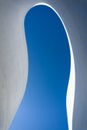 Low angle view of Curved detail and shadow of concrete with beautiful blue sky