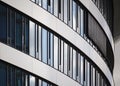 Curved glass facade of modern building Royalty Free Stock Photo