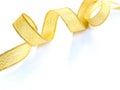 Curved gold satin ribbon