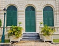 3 curved green doors