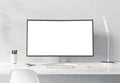 Curved monitor on white desktop concrete interior mockup 3D rendering