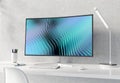 Curved monitor on white desktop and concrete interior mockup 3D rendering