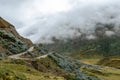 Curved mountain road in misty mountains, Abra Mariano Llamoja, pass between Yanama and Totora, The Choquequirao trek, Peru