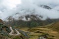 Curved mountain road in misty mountains, Abra Mariano Llamoja, pass between Yanama and Totora, The Choquequirao trek, Peru