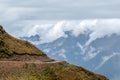 Curved mountain road in misty mountains, Abra Mariano Llamoja, pass between Yanama and Totora, The Choquequirao trek, Peru