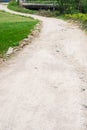 Curved muddy pathway Royalty Free Stock Photo