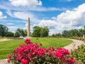 World War I memorial behind a red rose in Walnut Hill Park in New Britain, Connecticut