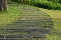 Curved Paver Path decoration landscape design, Walkway Through Grass field garden Walkway and Path Royalty Free Stock Photo