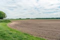 Curved potato ridges in a Dutch polder landscape Royalty Free Stock Photo