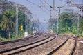 Curved railway tracks disappearing into the distance