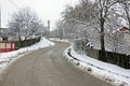 Curved recently plowed road