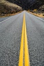 Curved Road with Double Yellow Lines Royalty Free Stock Photo