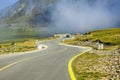 Curved road in mountain landscape, Transalpina. Royalty Free Stock Photo