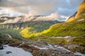 Curved road and mountain valley panorama on the way from Dalsnibba to Geiranger fjord, Geiranger, Sunnmore,  Romsdal county, Royalty Free Stock Photo