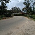 a curved road in a rural area Royalty Free Stock Photo