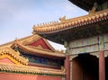 Curved roofs with gold patterns in traditional Chinese style with ceramic figures. The Imperial Palace