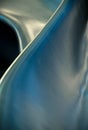 Curved smooth blue and silver metal forms abstract art Royalty Free Stock Photo