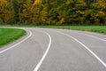 Curved sports track with autumn trees