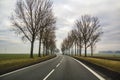 Curved Two Lane Country Road Winding Through Trees. Royalty Free Stock Photo