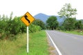 Curved way ahead traffic road warning sign. Royalty Free Stock Photo